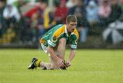 3 July 2005; Barry Prior, Leitrim, adjusts his boots during the game. Bank of Ireland All-Ireland Senior Football Championship Qualifier, Round 2, Leitrim v Meath, Sean McDiarmuid Park, Carrick-on-Shannon, Co. Leitrim. Picture credit; Ray McManus / SPORTSFILE