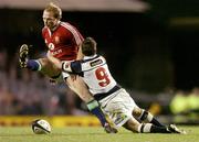 5 July 2005; Matt Dawson, British and Irish Lions, gets caught in possession by Steve Devine, Auckland. British and Irish Lions Tour to New Zealand 2005, 2nd Test, Auckland v British and Irish Lions, Eden Park, Auckland, New Zealand. Picture credit; Brendan Moran / SPORTSFILE