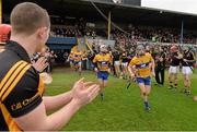 16 February 2014; The Clare team, including David McInerney, right, and Conor McGrath, are given a 'guard of honour' by the Kilkenny team as they make their way out for the game. Allianz Hurling League, Division 1A, Round 1, Clare v Kilkenny, Cusack Park, Ennis, Co. Clare. Picture credit: Diarmuid Greene / SPORTSFILE