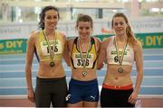 16 February 2014; Winner of the women's 800m event Ciara Everard, UCD A.C., Dublin, centre, with second place Fiona Kehoe, Kilmore A.C., Wexford, right, and third place Brona Furlong, Slaney Olympic A.C., Wexford. Woodie’s DIY National Senior Indoor Track and Field Championships - Sunday. Athlone Institute of Technology International Arena, Athlone, Co. Westmeath. Picture credit: Stephen McCarthy / SPORTSFILE