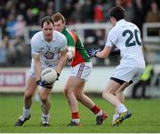 2 February 2014; Michael Foley, Kildare, supported by team-mate David Hyland, right, in action against Adam Gallagher, Mayo. Allianz Football League, Division 1, Round 1, Kildare v Mayo, St Conleth's Park, Newbridge, Co. Kildare. Picture credit: Piaras Ó Mídheach / SPORTSFILE