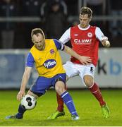 17 February 2014; Stephen O'Donnell, Dundalk, in action against Greg Bolger, St Patrick's Athletic. Leinster Senior Cup, Fourth Round, St Patrick's Athletic v Dundalk, Richmond Park, Dublin. Picture credit: David Maher / SPORTSFILE