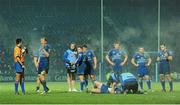 14 February 2014; Leo Cullen, Leinster, in conversation with refreee Marius Mitrea while team-mate Isaac Boss receives treatment. Celtic League 2013/14 Round 14, Leinster v Newport Gwent Dragons, RDS, Ballsbridge, Dublin. Picture credit: Piaras Ó Mídheach / SPORTSFILE