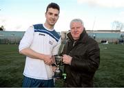 18 February 2014; Dublin City University 'C' captain Sean Dean receives the cup from Terry McAuley, Chairman, IUFU, after the game. UMBRO CUFL Third Division Final, IT Carlow 'D' v Dublin City University 'C', Leixlip United, Leixlip, Co. Kildare. Picture credit: Barry Cregg / SPORTSFILE