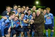18 February 2014; University College Dublin captain Samir Belhout is presented with the cup by Terry McAuley, Chairman, IUFU. UMBRO CUFL Premier Division Final, IT Carlow v University College Dublin, Frank Cooke Park, Tolka Rovers FC, Dublin. Picture credit: Pat Murphy / SPORTSFILE