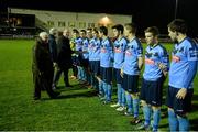 18 February 2014; The University College Dublin players stand for the national anthem before the game. UMBRO CUFL Premier Division Final, IT Carlow v University College Dublin, Frank Cooke Park, Tolka Rovers FC, Dublin. Picture credit: Pat Murphy / SPORTSFILE