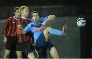 18 February 2014; Robert Benson, University College Dublin, in action against Stephen Last and Ross Kenny, left, IT Carlow. UMBRO CUFL Premier Division Final, IT Carlow v University College Dublin, Frank Cooke Park, Tolka Rovers FC, Dublin. Picture credit: Pat Murphy / SPORTSFILE