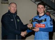18 February 2014; Dean Clarke, University College Dublin, is presented with the player of the match award by Joe O'Brien, CUFL. UMBRO CUFL Premier Division Final, IT Carlow v University College Dublin, Frank Cooke Park, Tolka Rovers FC, Dublin. Picture credit: Pat Murphy / SPORTSFILE
