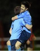 18 February 2014; Niall Wright and Tristan Dent, left, University College Dublin, celebrate at the final whistle. UMBRO CUFL Premier Division Final, IT Carlow v University College Dublin, Frank Cooke Park, Tolka Rovers FC, Dublin. Picture credit: Pat Murphy / SPORTSFILE