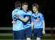 18 February 2014; University College Dublin's Robert Murray, left, Conor Butler and Timmy Molloy, right, celebrate at the final whistle. UMBRO CUFL Premier Division Final, IT Carlow v University College Dublin, Frank Cooke Park, Tolka Rovers FC, Dublin. Picture credit: Pat Murphy / SPORTSFILE