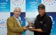 3 July 2005; Darren Clarke who was presented with the Leading Irish Golfer award by Gerry McQuaid, Commercial Director of O2 at the Smurfit European Open. Û10,000 has been donated to the Darren Clarke Foundation for under priviledged children to encourage them into the game of golf. K Club, Straffan, Co. Kildare. Picture credit; Matt Browne / SPORTSFILE