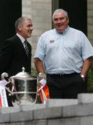 6 July 2005; Joe Kernan, right, Armagh manager, and Mickey Harte, Tyrone manager, at a photocall ahead of this weekend's Bank of Ireland Connacht and Ulster Provincial Senior Football Championship Finals. Bank of Ireland Head Office, Lower Baggot Street, Dublin. Picture credit; David Maher / SPORTSFILE
