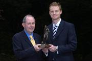 6 July 2005; UCD captain Tony McDonnell, right, who was presented with the eircom / Soccer Writers Association of Ireland Player of the Month award for June by Padraig Corkery, Head of Sponsorship, eircom. Merrion Square, Dublin. Picture credit; Brian Lawless / SPORTSFILE