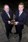 7 July 2005; UCD captain Tony McDonnell, right, who was presented with the eircom / Soccer Writers Association of Ireland Player of the Month award for June by Padraig Corkery, Head of Sponsorship, eircom. Merrion Square, Dublin. Picture credit; Brian Lawless / SPORTSFILE