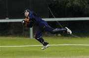 9 July 2005; Scotland wicket-keeper Douglas Lockhart, catches the ball off the bat of Clay Smith, Bermuda, from a bowl of team-mate John Blain during the 23rd over. ICC Trophy Semi-Final, Scotland v Bermuda, The Hills, Milverton, Skerries, Co. Dublin. Picture credit; David Maher / SPORTSFILE