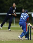 9 July 2005; Janeiro Tucket, Bermuda, is clean bowled, by Scotland bowler Paul Hoffmann, during the 30th over. ICC Trophy Semi-Final, Scotland v Bermuda, The Hills, Milverton, Skerries, Co. Dublin. Picture credit; David Maher / SPORTSFILE