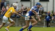 9 July 2005; Mark Rooney, Laois, in action against Johnny Campbell, Antrim. Guinness All-Ireland Senior Hurling Championship Qualifier, Round 3, Antrim v Laois, Casement Park, Belfast. Picture credit; Matt Browne / SPORTSFILE