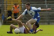 9 July 2005; Padraig Curtis, Wexford, in action against Shane McManus, Monaghan. Bank of Ireland All-Ireland Senior Football Championship Qualifier, Round 2, Monaghan v Wexford, St. Tighernach's Park, Clones, Co. Monaghan. Picture credit; Pat Murphy / SPORTSFILE
