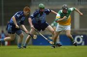 9 July 2005; Brendan Murphy, Offaly, in action against Dublin players Derek O'Reilly, left, and Ronan Fallon. Guinness All-Ireland Senior Hurling Championship Qualifier, Round 3, Dublin v Offaly, Parnell Park, Dublin. Picture credit; David  Levingstone/ SPORTSFILE