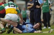 9 July 2005; Gerard O'Meara, Dublin, tries to clear under pressure from Dylan Hayden, Offaly. Guinness All-Ireland Senior Hurling Championship Qualifier, Round 3, Dublin v Offaly, Parnell Park, Dublin. Picture credit; David  Levingstone/ SPORTSFILE
