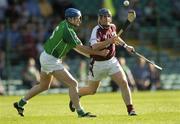 9 July 2005; David Forde, Galway, is tackled by Brian Geary, Limerick. Guinness All-Ireland Senior Hurling Championship Qualifier, Round 3, Limerick v Galway, Gaelic Grounds, Limerick. Picture credit; Damien Eagers / SPORTSFILE