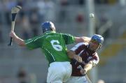9 July 2005; David Tierney, Galway, is tackled by Brian Geary, Limerick. Guinness All-Ireland Senior Hurling Championship Qualifier, Round 3, Limerick v Galway, Gaelic Grounds, Limerick. Picture credit; Damien Eagers / SPORTSFILE