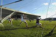 9 July 2005; TJ Ryan, Limerick hits a penalty past Galways Colin Coen, left, Liam Donoghue, goalkeeper, centre, and Damien Joyce to score a goal. Guinness All-Ireland Senior Hurling Championship Qualifier, Round 3, Limerick v Galway, Gaelic Grounds, Limerick. Picture credit; Damien Eagers / SPORTSFILE