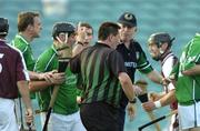 9 July 2005; Limerick manager Joe McKenna argues with referee Brian Gavin after a late decision against Limerick. Guinness All-Ireland Senior Hurling Championship Qualifier, Round 3, Limerick v Galway, Gaelic Grounds, Limerick. Picture credit; Damien Eagers / SPORTSFILE