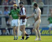 9 July 2005; A streaker walks past Galway and Limerick players. Guinness All-Ireland Senior Hurling Championship Qualifier, Round 3, Limerick v Galway, Gaelic Grounds, Limerick. Picture credit; Damien Eagers / SPORTSFILE