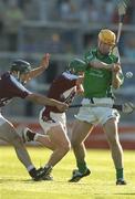 9 July 2005; Niall Moran, Limerick, is tackled by David Collins, (centre) and Fergal Healy, Galway. Guinness All-Ireland Senior Hurling Championship Qualifier, Round 3, Limerick v Galway, Gaelic Grounds, Limerick. Picture credit; Damien Eagers / SPORTSFILE