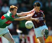 10 July 2005; David Neary, Galway, is tackled byTom Cunniff, Mayo. Connacht Minor Football Championship Final, Galway v Mayo, Pearse Stadium, Galway. Picture credit; David Maher / SPORTSFILE