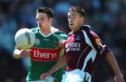 10 July 2005; Owen Concannon, Galway, is tackled by Ger Cafferkey, Mayo. Connacht Minor Football Championship Final, Galway v Mayo, Pearse Stadium, Galway. Picture credit; David Maher / SPORTSFILE