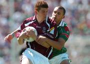 10 July 2005; Kieran Fitzgerald, Galway, is tackled by Trevor Mortimer, Mayo. Bank of Ireland Connacht Senior Football Championship Final, Galway v Mayo, Pearse Stadium, Galway. Picture credit; David Maher / SPORTSFILE