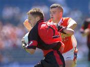 10 July 2005; John McClorey, Down, is tackled by Kevin O'Rourke, Armagh. Ulster Minor Football Championship Final, Armagh v Down, Croke Park, Dublin. Picture credit; Brian Lawless / SPORTSFILE