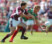 10 July 2005; Ciaran McDonald, Mayo, is tackled by Matthew Clancy, Galway. Bank of Ireland Connacht Senior Football Championship Final, Galway v Mayo, Pearse Stadium, Galway. Picture credit; David Maher / SPORTSFILE
