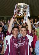 10 July 2005; Galway captain Padraic Joyce, right, lifts the Nestor Cup with team-mate Paul Clancy at the end of the game. Bank of Ireland Connacht Senior Football Championship Final, Galway v Mayo, Pearse Stadium, Galway. Picture credit; David Maher / SPORTSFILE