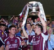 10 July 2005; Galway captain Padraic Joyce, right, lifts the Nestor Cup with team-mate Paul Clancy at the end of the game. Bank of Ireland Connacht Senior Football Championship Final, Galway v Mayo, Pearse Stadium, Galway. Picture credit; David Maher / SPORTSFILE