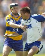 10 July 2005; Dan Shanahan, Waterford, is tackled by Gerry Quinn, Clare. Guinness All-Ireland Senior Hurling Championship Qualifier, Round 3, Clare v Waterford, Cusack Park, Ennis, Co. Clare. Picture credit; Damien Eagers / SPORTSFILE
