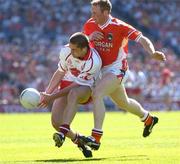 10 July 2005; Stephen O'Neill, Tyrone, in action against Francie Bellew, Armagh. Bank of Ireland Ulster Senior Football Championship Final, Armagh v Tyrone, Croke Park, Dublin. Picture credit; Ray McManus / SPORTSFILE