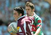 10 July 2005; Kieran Comer, Galway, is tackled by James Gill, Mayo. Bank of Ireland Connacht Senior Football Championship Final, Galway v Mayo, Pearse Stadium, Galway. Picture credit; David Maher / SPORTSFILE