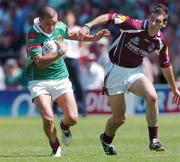 10 July 2005; Trevor Mortimer, Mayo, is tackled by Damien Burke, Galway. Bank of Ireland Connacht Senior Football Championship Final, Galway v Mayo, Pearse Stadium, Galway. Picture credit; David Maher / SPORTSFILE