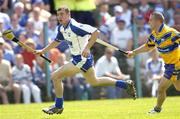 10 July 2005; Eoin Kelly, Waterford, in action against Colin Lynch, Clare. Guinness All-Ireland Senior Hurling Championship Qualifier, Round 3, Clare v Waterford, Cusack Park, Ennis, Co. Clare. Picture credit; Damien Eagers / SPORTSFILE