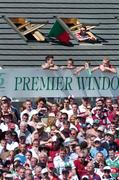 10 July 2005; Spectators watch the game from various vantage points overlooking the ground. Bank of Ireland Connacht Senior Football Championship Final, Galway v Mayo, Pearse Stadium, Galway. Picture credit; David Maher / SPORTSFILE
