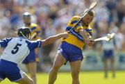 10 July 2005; Tony Carmody, Clare, is tackled by Tony Browne, Waterford. Guinness All-Ireland Senior Hurling Championship Qualifier, Round 3, Clare v Waterford, Cusack Park, Ennis, Co. Clare. Picture credit; Damien Eagers / SPORTSFILE