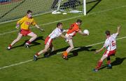 10 July 2005; Armagh's Steven McDonnell under pressure from Tyrone's Shane Sweeney and Davy Harte, right, turns to shoot past John Devine for his sides second goal. Bank of Ireland Ulster Senior Football Championship Final, Armagh v Tyrone, Croke Park, Dublin. Picture credit; Brian Lawless / SPORTSFILE