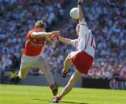 10 July 2005; Peter Canavan, Tyrone, in action against Francie Bellew, Armagh. Bank of Ireland Ulster Senior Football Championship Final, Armagh v Tyrone, Croke Park, Dublin. Picture credit; Ray McManus / SPORTSFILE