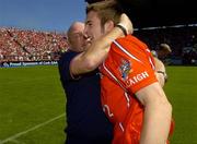 10 July 2005; Cork manager Der O'Donovan celebrates with Rickey Kenny. Munster Minor Football Championship Final, Cork v Kerry, Pairc Ui Chaoimh, Cork. Picture credit; Pat Murphy / SPORTSFILE