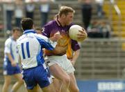 9 July 2005; Nicky Lambert, Wexford, in action against Paul Finlay, Monaghan. Bank of Ireland All-Ireland Senior Football Championship Qualifier, Round 2, Monaghan v Wexford, St. Tighernach's Park, Clones, Co. Monaghan. Picture credit; Pat Murphy / SPORTSFILE