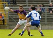 9 July 2005; Diarmuid Kinsella, Wexford, in action against Gary McQuaid, Monaghan. Bank of Ireland All-Ireland Senior Football Championship Qualifier, Round 2, Monaghan v Wexford, St. Tighernach's Park, Clones, Co. Monaghan. Picture credit; Pat Murphy / SPORTSFILE