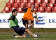 13 July 2005; Liam Kearney in action against team-mate Alan Bennett during squad training. Cork City squad training, Aukstaitija, Paneveyzs, Lithuania. Picture credit; Brian Lawless / SPORTSFILE
